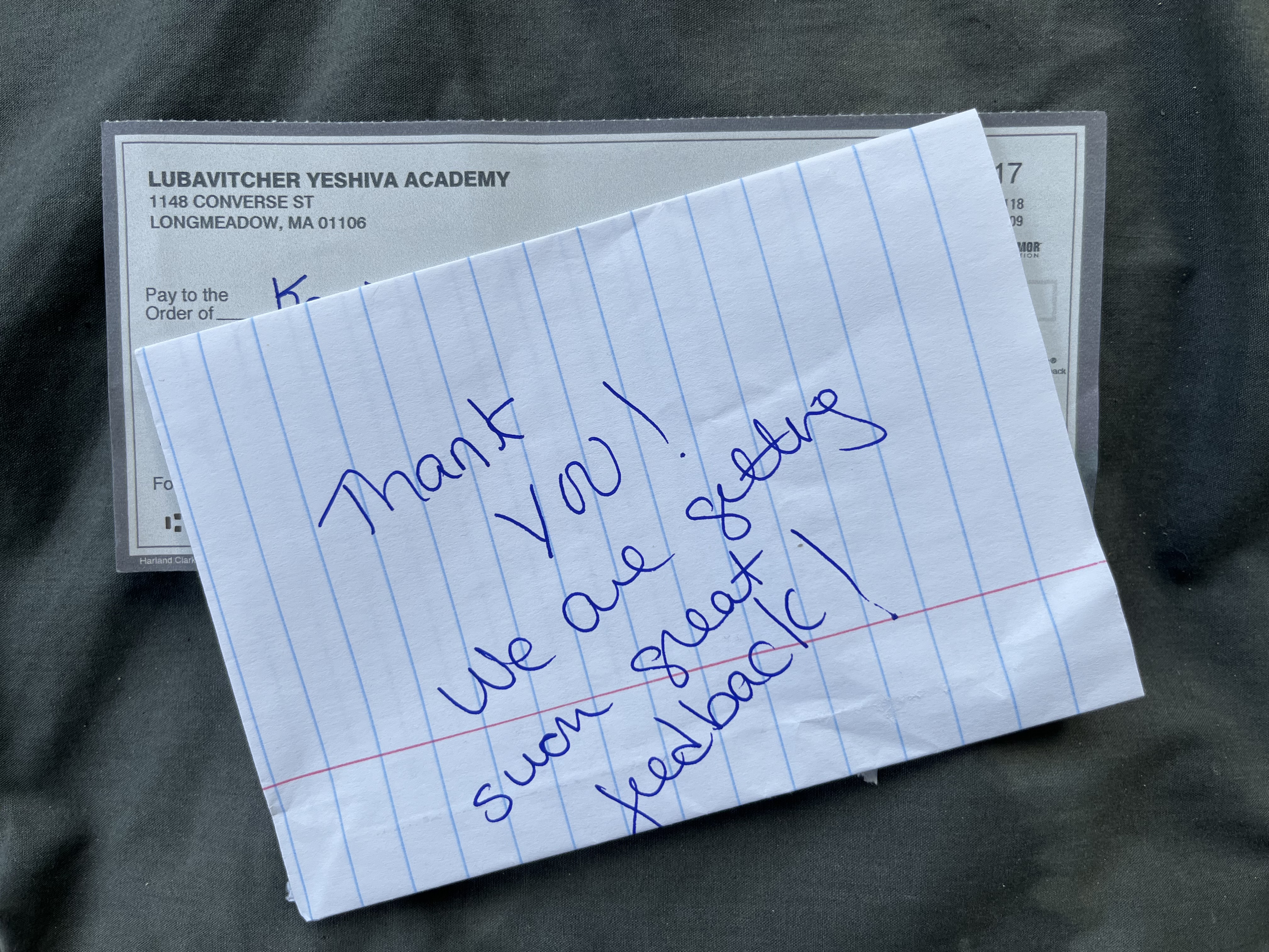Handwritten note praising our performance.